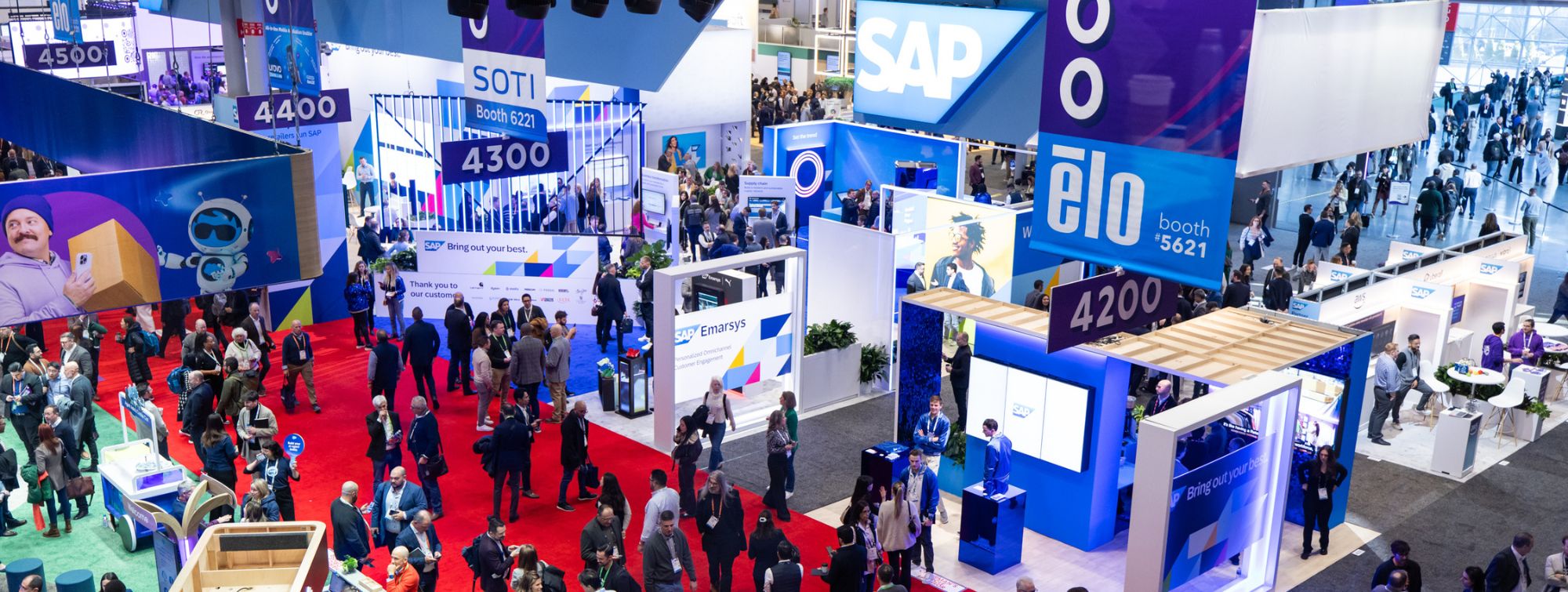 Lively overview of NRF trade show with many booths and attendees